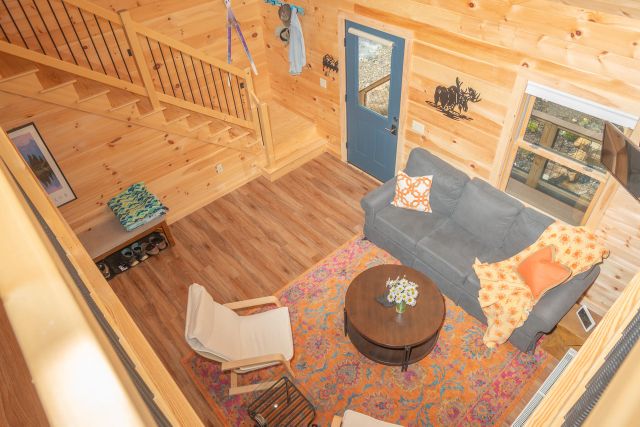 Bird's-eye view of the living room from the loft balcony